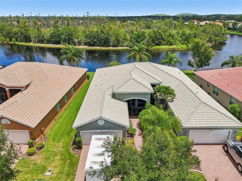Discover this exquisite waterfront home nestled in the desirable - Beach Home for sale in Wimauma, Florida on Beachhouse.com