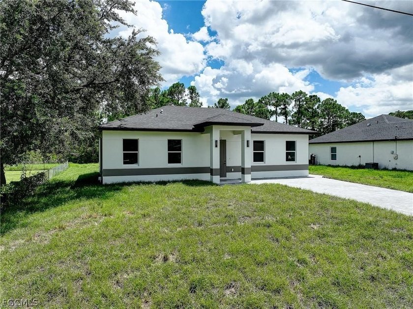 Stunning new construction offering modern design, flexible - Beach Home for sale in Lehigh Acres, Florida on Beachhouse.com