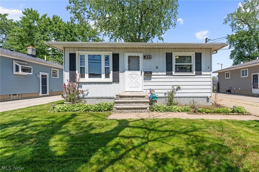 This charming 3 bedroom, 2 full bath ranch is situated on a - Beach Home for sale in Eastlake, Ohio on Beachhouse.com