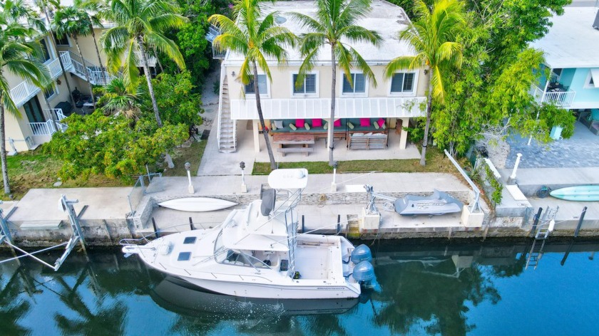 SPECTACULAR CBS Waterfront Home 3/3.- A 2/2 up and a 1/1 down - Beach Home for sale in Key Largo, Florida on Beachhouse.com