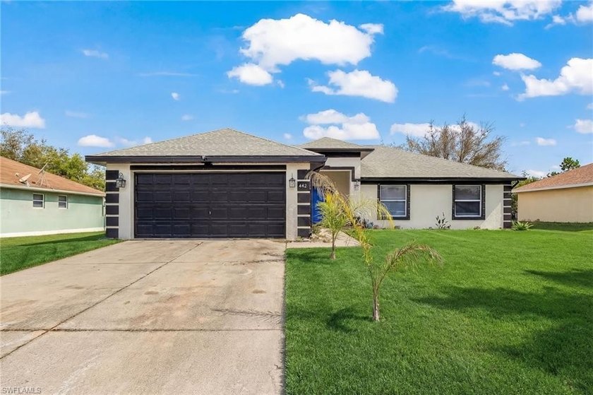 You'll relish coming home to this 4 Bedrooms 2 Bath, 2 car - Beach Home for sale in Lehigh Acres, Florida on Beachhouse.com