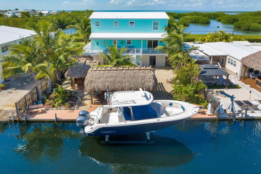 Discover the ultimate waterfront living in this stunning - Beach Home for sale in Key Largo, Florida on Beachhouse.com