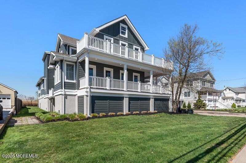 Step into effortless coastal living in this stunning custom - Beach Home for sale in Monmouth Beach, New Jersey on Beachhouse.com
