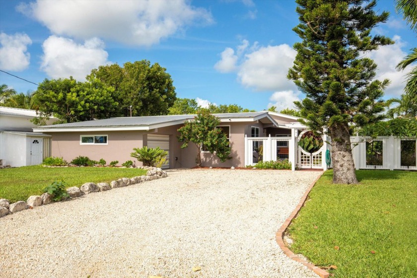 Discover Key West Charm in this Canal Front Gem! Welcome to this - Beach Home for sale in Big Pine Key, Florida on Beachhouse.com