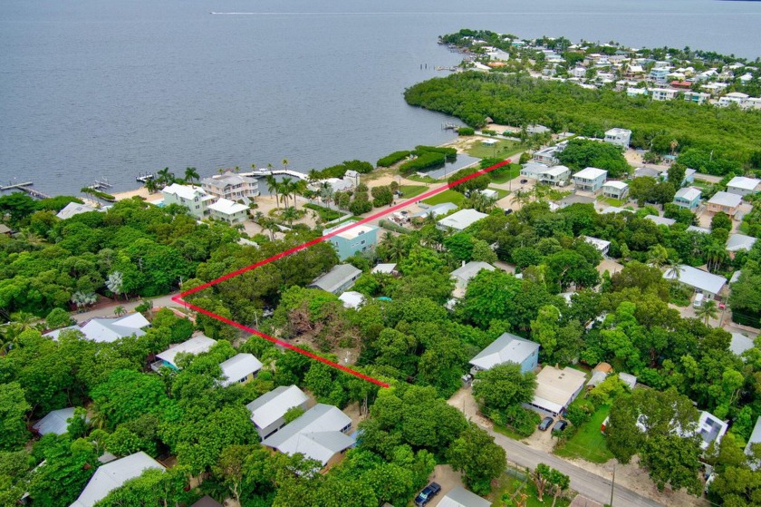 Build your dream home in the heart of paradise! This premium - Beach Lot for sale in Key Largo, Florida on Beachhouse.com