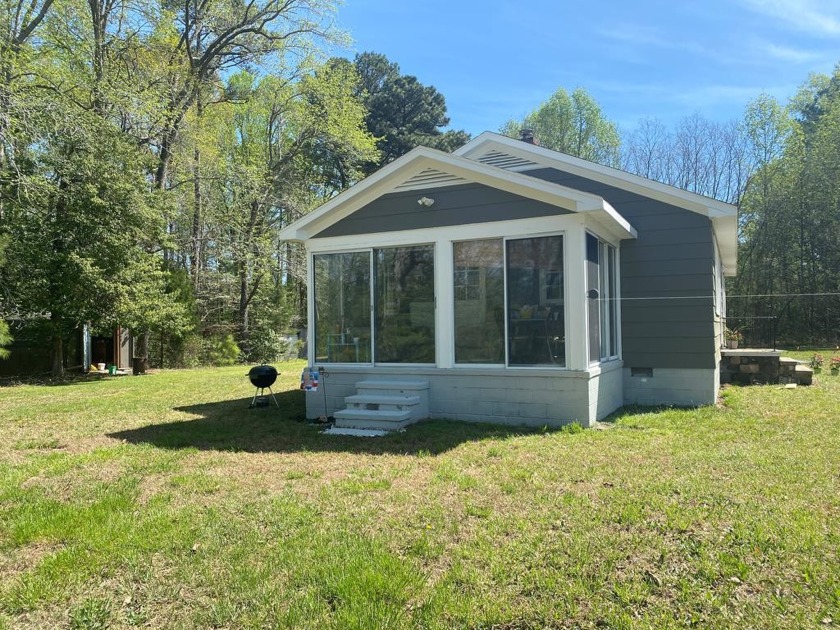NEWLY RENOVATED COTTAGE ON 2.3 SECLUDED ACRES ON HULL CREEK! - Beach Home for sale in Heathsville, Virginia on Beachhouse.com