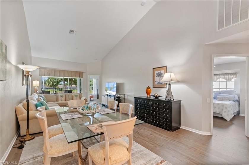 IMMACULATE TURNKEY CONDO WITH GOLF AND LAKE VIEWS: This - Beach Condo for sale in Bonita Springs, Florida on Beachhouse.com