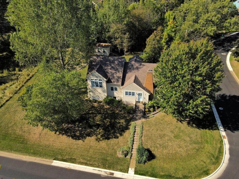 Stunning curb appeal with unique quality throughout, this - Beach Home for sale in Duluth, Minnesota on Beachhouse.com