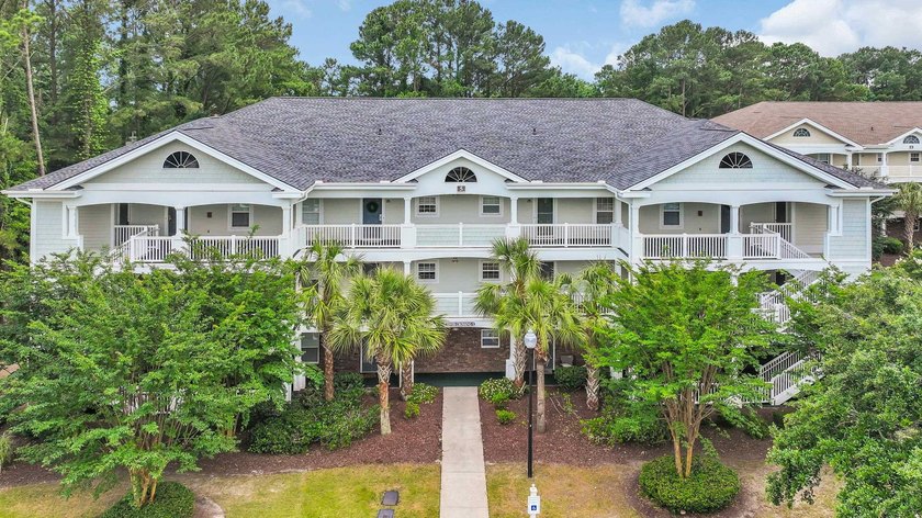 Pond and golf course views from the covered porch on this great - Beach Condo for sale in North Myrtle Beach, South Carolina on Beachhouse.com