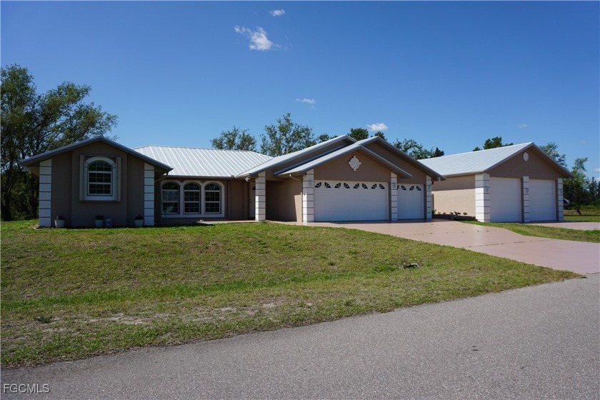 BOATERS, CAR COLLECTORS, HOBBYISTS, AND RV TRAVELERS WILL LOVE - Beach Home for sale in Punta Gorda, Florida on Beachhouse.com