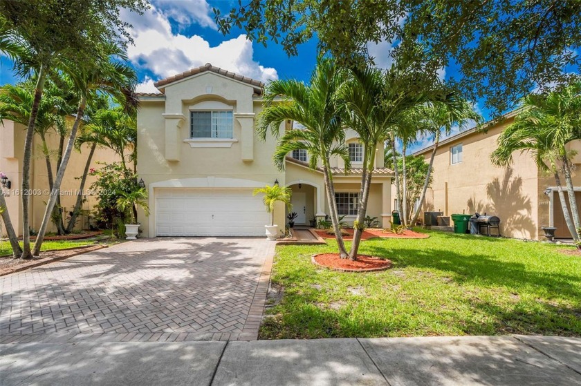 BEAUTIFUL UPGRADED HOME WITH 7 BEDROOMS 4 FULL BATHS PLUS A LOFT - Beach Home for sale in Miramar, Florida on Beachhouse.com