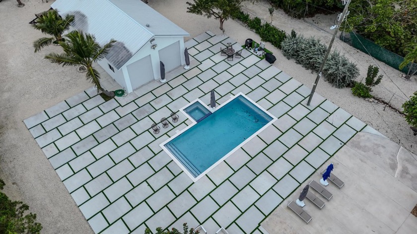 Discover your dream retreat in this beautiful oceanfront home - Beach Home for sale in Plantation Key, Florida on Beachhouse.com