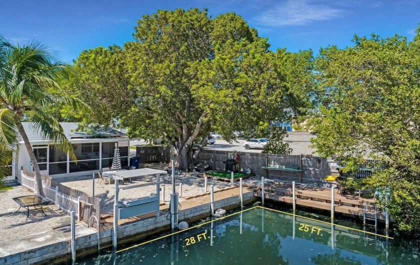 The perfect ELEVATED fish camp!  With a 28 ft. concrete dock and - Beach Home for sale in Marathon, Florida on Beachhouse.com