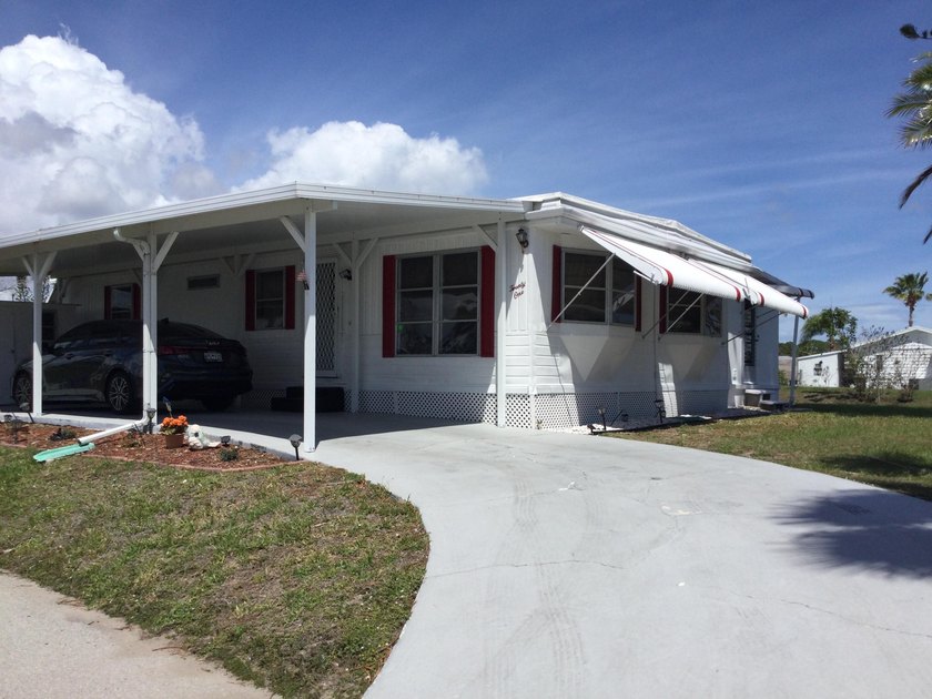 Beautifully maintained home overlooking the canal. Home features - Beach Home for sale in Port Saint Lucie, Florida on Beachhouse.com