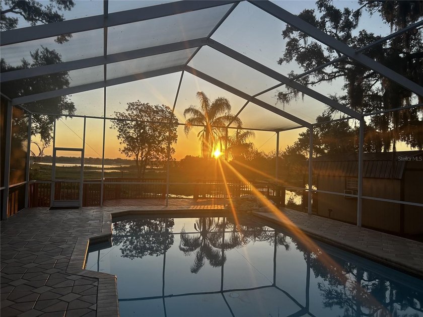 Wake every morning to stunning sunrise vistas of Hunter's Lake - Beach Home for sale in Spring Hill, Florida on Beachhouse.com