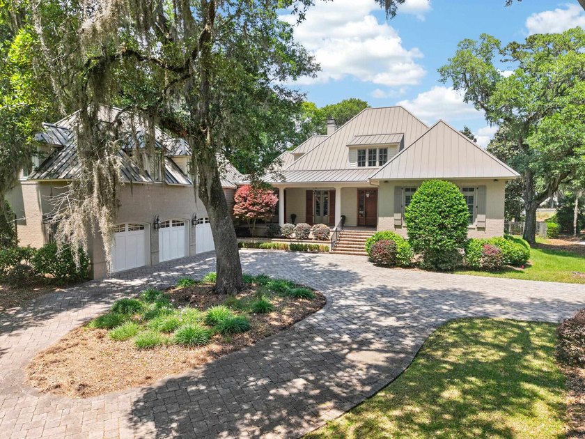 Perfectly positioned on the 12th green with serene pond views - Beach Home for sale in Georgetown, South Carolina on Beachhouse.com
