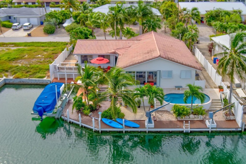 Welcome to your waterfront paradise in Cudjoe Gardens! This - Beach Home for sale in Cudjoe Key, Florida on Beachhouse.com