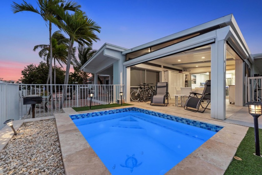 This beautifully remodeled half duplex offers an escape right on - Beach Home for sale in Key Colony Beach, Florida on Beachhouse.com