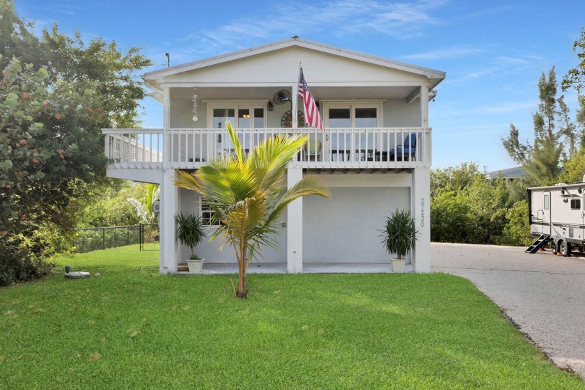 Discover your peaceful retreat on this rare double lot with - Beach Home for sale in Ramrod Key, Florida on Beachhouse.com