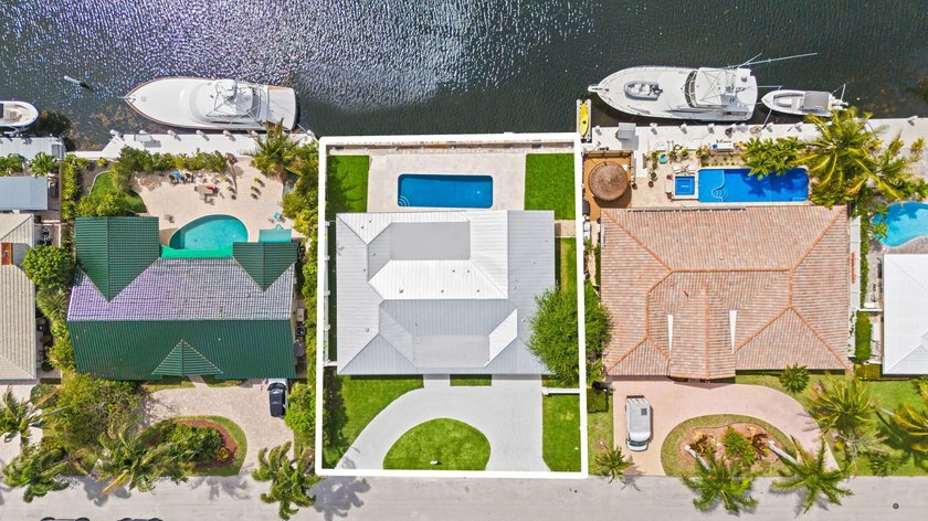Fully rebuilt from the studs, this turnkey 4-bedroom, 3.5-bath - Beach Home for sale in Lighthouse Point, Florida on Beachhouse.com