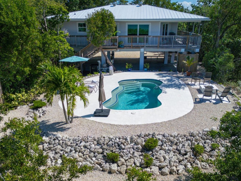 STUNNING WATERFRONT VIEWS and RARE PRIVACY in the Keys! Welcome - Beach Home for sale in Little Torch Key, Florida on Beachhouse.com