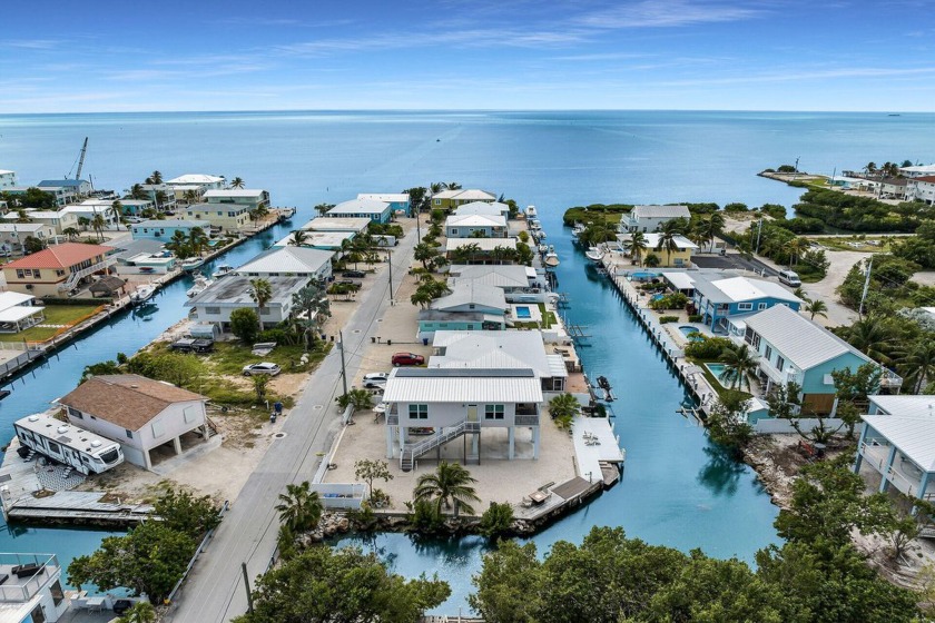 WATER VIEWS FROM EVERY ROOM IN THIS HOME WITH 9 FT CEILINGS AND - Beach Home for sale in Marathon, Florida on Beachhouse.com