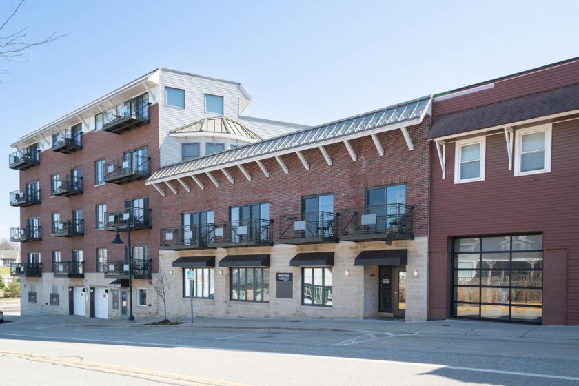 Rare opportunity alert! Nestled in downtown South Haven, this - Beach Condo for sale in South Haven, Michigan on Beachhouse.com