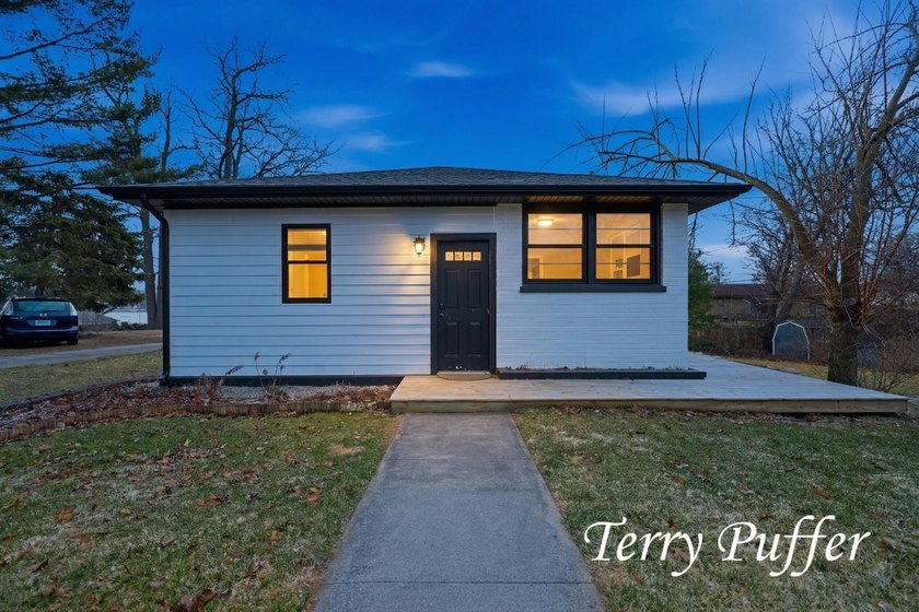 Charming ranch home on a spacious corner lot in Laketon - Beach Home for sale in Muskegon, Michigan on Beachhouse.com