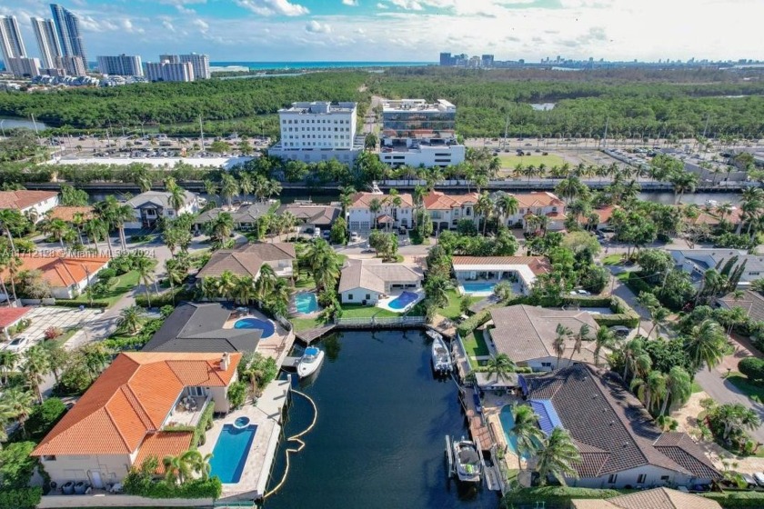 Experience unparalleled canal views in Eastern Shores with this - Beach Home for sale in North Miami Beach, Florida on Beachhouse.com