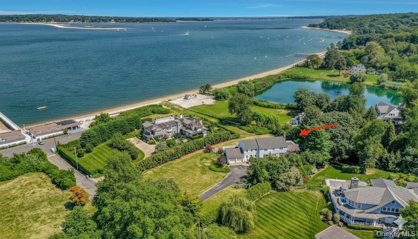 Discover a rare waterfront opportunity in the prestigious Bay - Beach Home for sale in Huntington Bay, New York on Beachhouse.com
