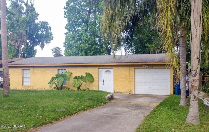 This well-maintained 1,500 sq. ft. concrete block home offers - Beach Home for sale in Daytona Beach, Florida on Beachhouse.com