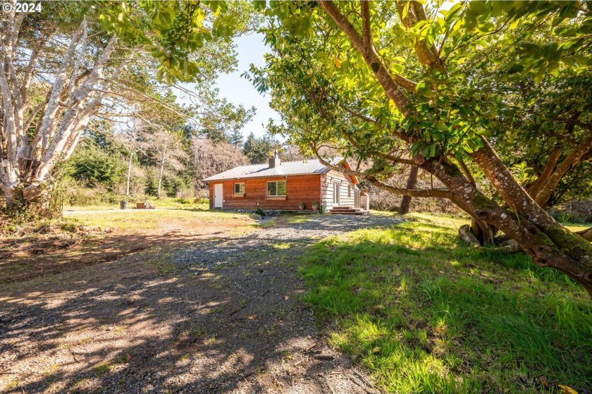 Set on 17 acres of farm and forest land, this completely - Beach Home for sale in Langlois, Oregon on Beachhouse.com