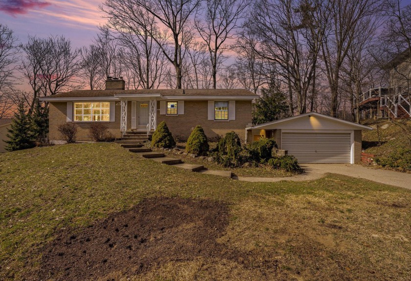 Here it is! This ranch home sits high on Doris Avenue in a - Beach Home for sale in Grand Haven, Michigan on Beachhouse.com