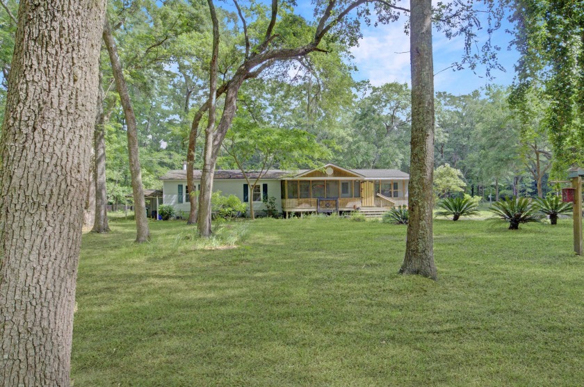 This is a rare opportunity to own an exquisite, secluded 5 - Beach Home for sale in Johns Island, South Carolina on Beachhouse.com