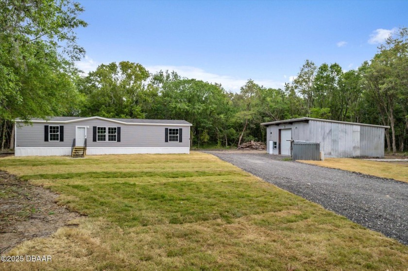 Country living with city convenience! This brand-new doublewide - Beach Home for sale in Bunnell, Florida on Beachhouse.com