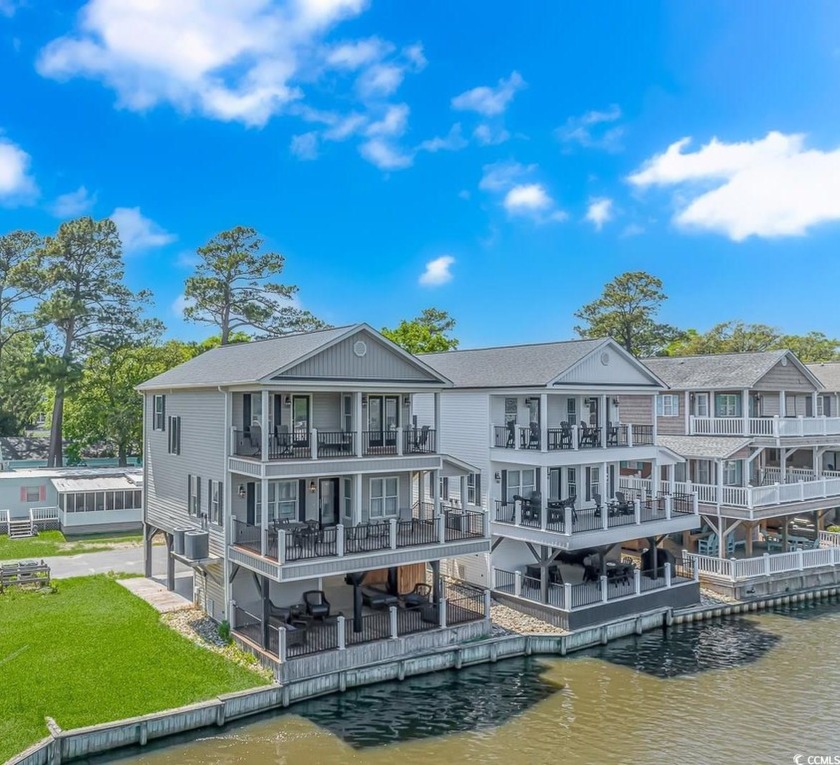 LUXURY at the BEACH!!! This LAKE FRONT 5 bedroom 3.5  bath - Beach Home for sale in Myrtle Beach, South Carolina on Beachhouse.com