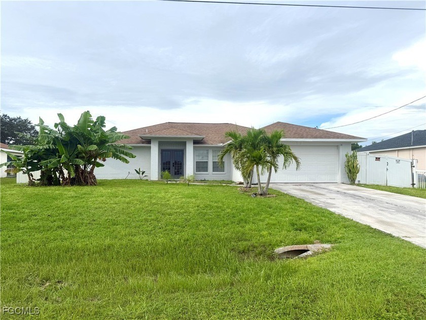 Welcome to this well-maintained home featuring a fenced-in - Beach Home for sale in Lehigh Acres, Florida on Beachhouse.com
