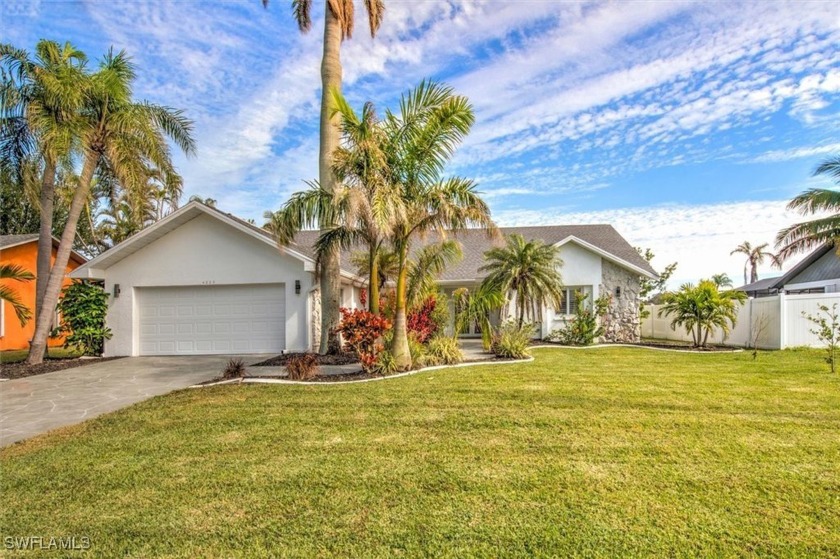 Welcome home to this 4/3/2 Gulf access pool home in the desired - Beach Home for sale in Cape Coral, Florida on Beachhouse.com