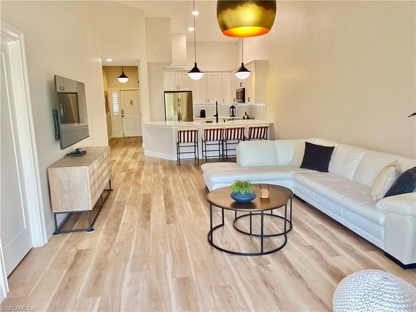 NEWLY RENOVATED - VAULTED CEILINGS - PRIVATE 2-CAR GARAGE! - Beach Condo for sale in Naples, Florida on Beachhouse.com