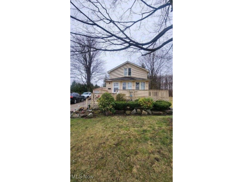 Nestled in a charming neighborhood, this lovely home provides - Beach Home for sale in Geneva, Ohio on Beachhouse.com