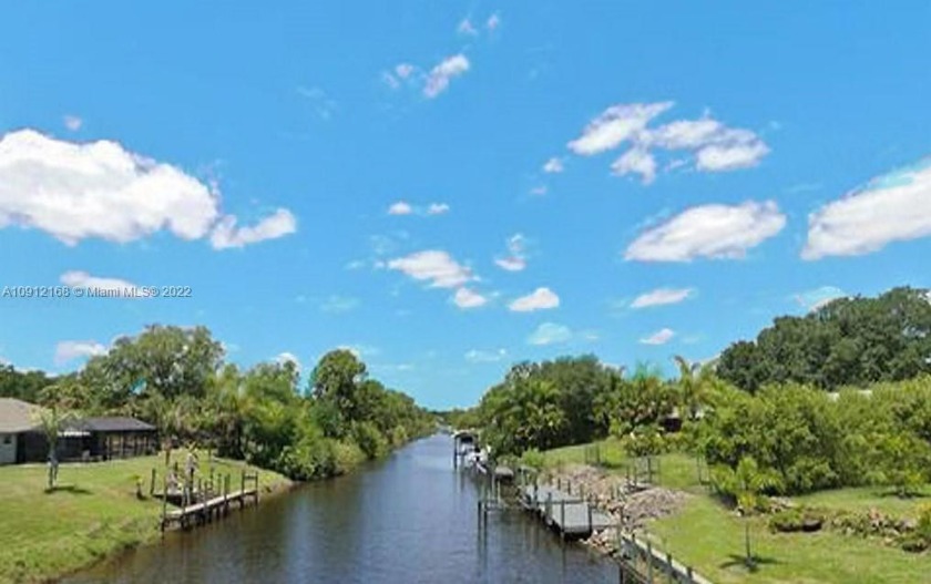 Great Waterfront Lot in wide Canal in Rotonda Lakes, public - Beach Lot for sale in Port Charlotte, Florida on Beachhouse.com