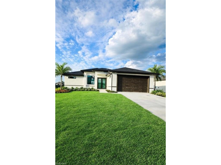 A lovely home featuring 3 bedrooms, 2 bathrooms, and a two-car - Beach Home for sale in Lehigh Acres, Florida on Beachhouse.com