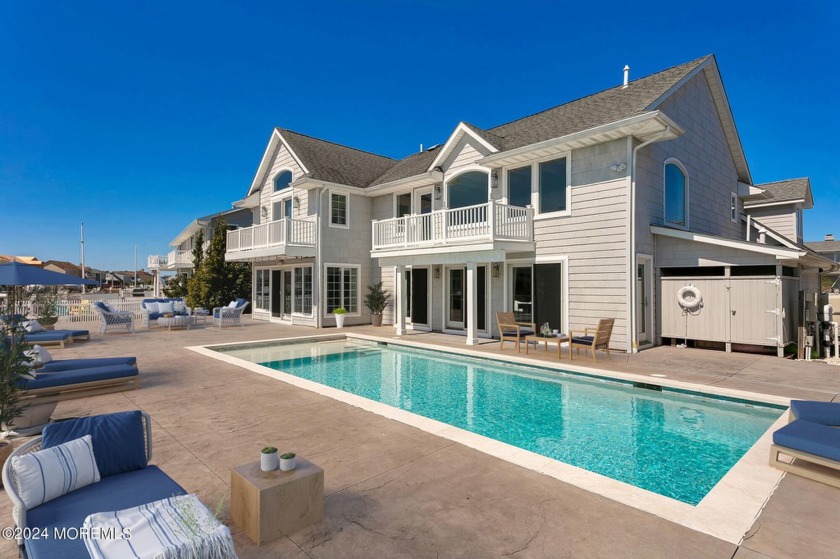 Discover coastal luxury at 254 Curtis Point Drive. This stunning - Beach Home for sale in Mantoloking, New Jersey on Beachhouse.com