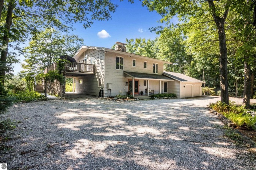 Welcome to a completely updated and enchanting 4-bedroom, 4-bath - Beach Home for sale in Cedar, Michigan on Beachhouse.com