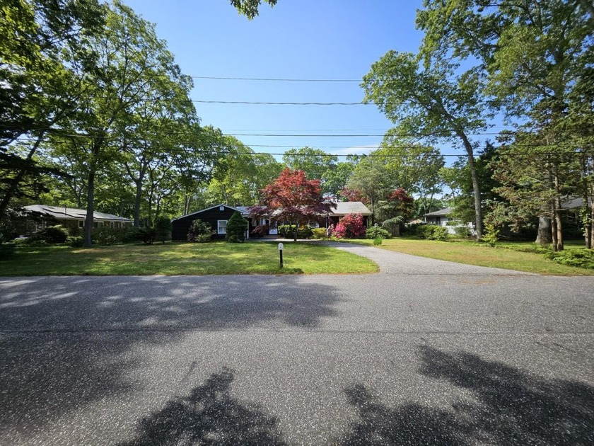 **Location, Location!** This stunning SOH boasts 3 bedrooms, 3 - Beach Home for sale in East Quogue, New York on Beachhouse.com