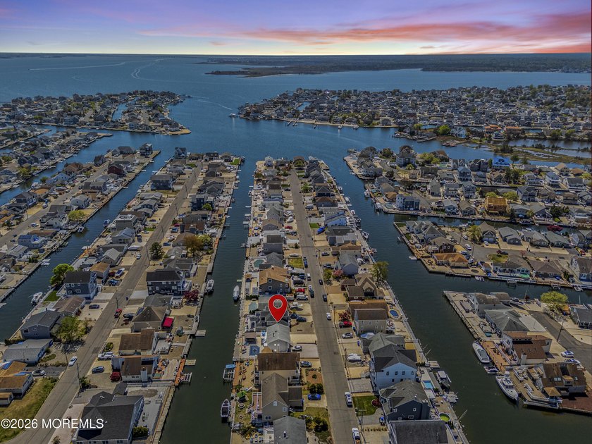 This beautifully designed four-bedroom waterfront home blends - Beach Home for sale in Toms River, New Jersey on Beachhouse.com