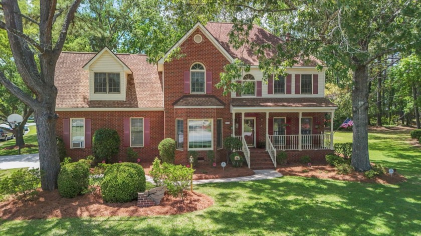 Welcome home to this colonial brick home located in the peaceful - Beach Home for sale in North Charleston, South Carolina on Beachhouse.com