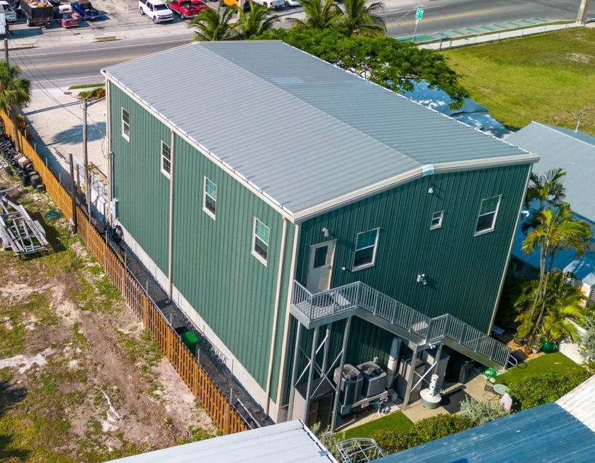 Happiness is having the space to enjoy your possessions, rain or - Beach Home for sale in Stock Island, Florida on Beachhouse.com