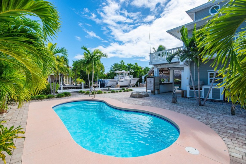 Nestled on the picturesque shores of Ramrod Key, this stunning - Beach Home for sale in Ramrod Key, Florida on Beachhouse.com