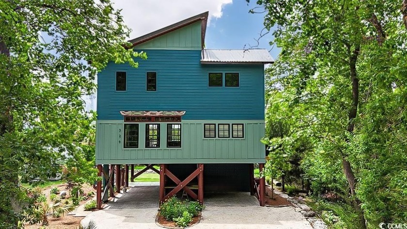Endless water views await you where Coastal Elegance Meets - Beach Home for sale in Georgetown, South Carolina on Beachhouse.com
